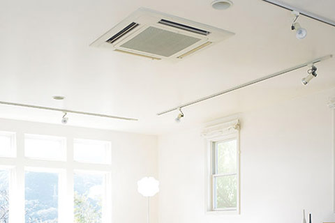 Photo of modern office with ceiling mounted air-con unit