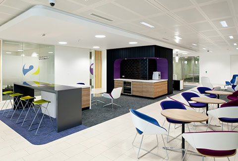 a photo of a comfortable office breakout area