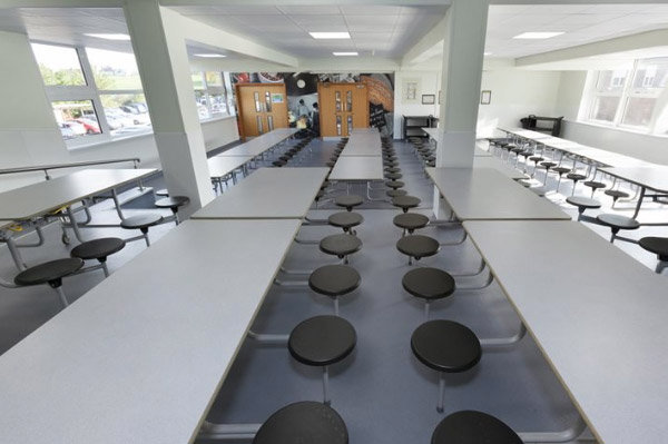 A photo looking down a refurbished student dining hall