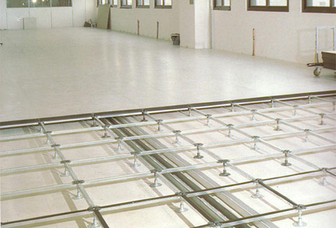 a photo showing partially revealed access flooring